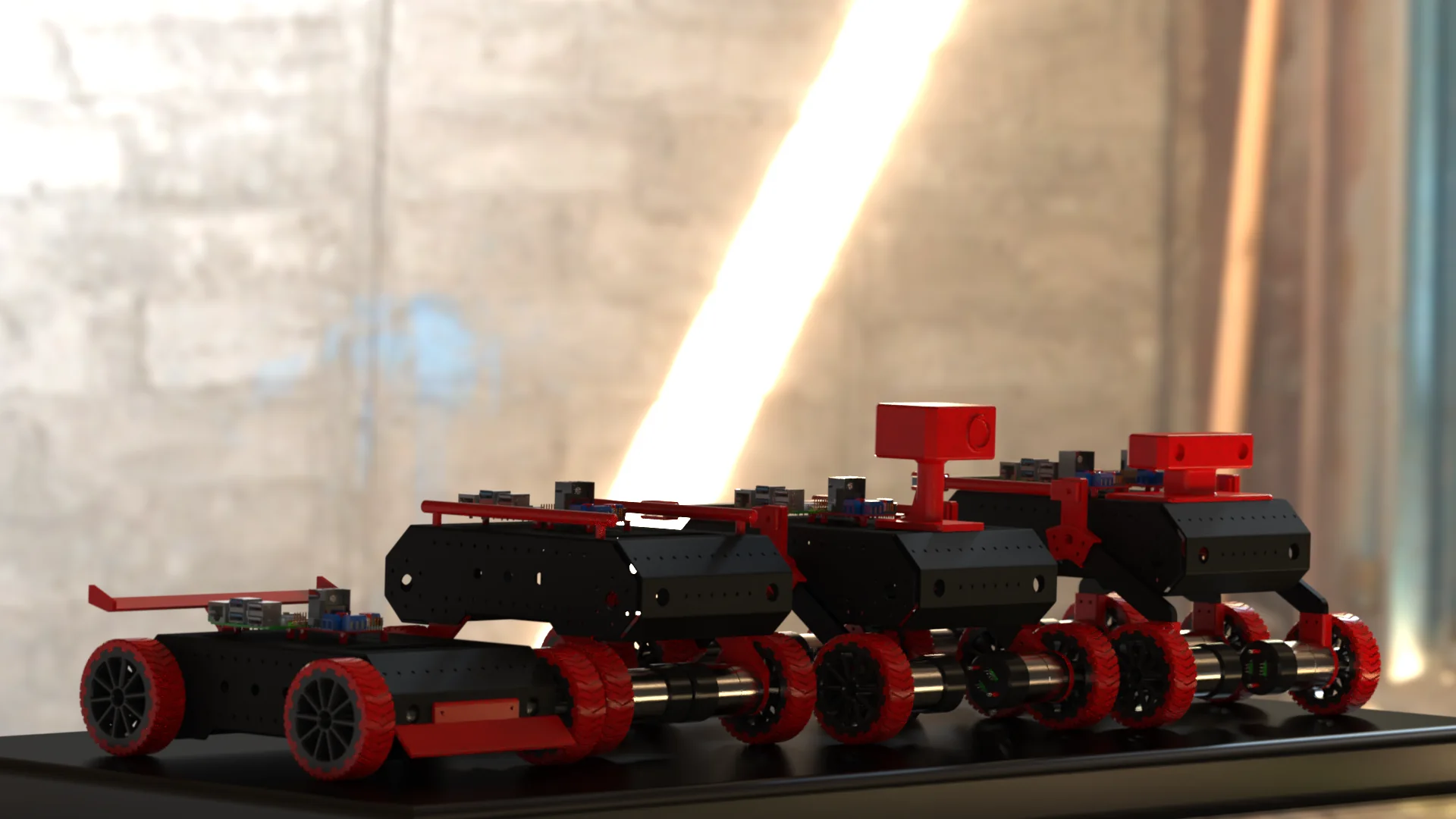 Three generations of the NOMAD educational rover platform, rendered side by side