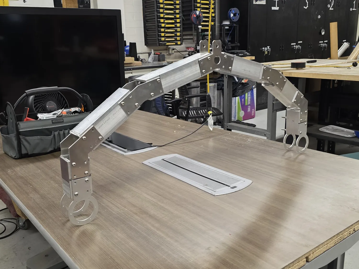 Rover arm assembly on the bench during integration